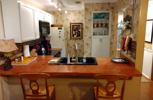 Thomas Drive Condo | Private Dock - Ground Floor - Poolside - Walk to the Beach