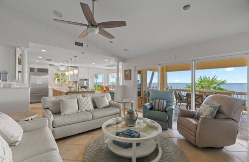 Marathon House | Private, Gated, Oceanfront, Beachfront 5-Star Estate with dock, putting green.