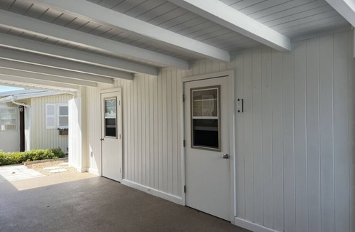 Golden Beach House | Private Golden Beach access for this Mid-Century Modern Home