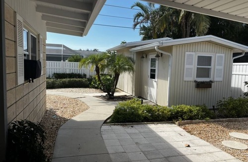 Golden Beach House | Private Golden Beach access for this Mid-Century Modern Home