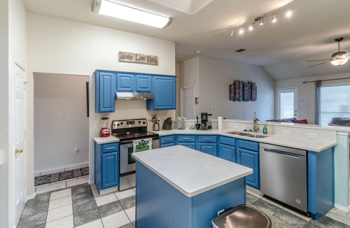 Crowley House | Private Heated Pool, Big Hot Tub, Fenced Yard, Fire Pit, 6 TVs, & Stone Floors