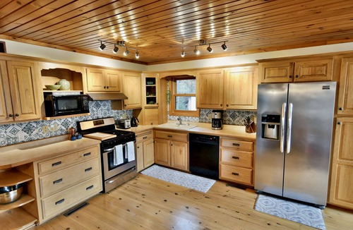 Spooner Ski Chalet | Private Lake Resort: sandy beach, home theater, fire pit, pontoon