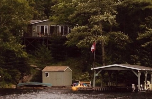 Tudor and Cashel Cabin | Private Lakefront 3 Bedroom Cabin with Private Dock and Boat Port. Boat Access