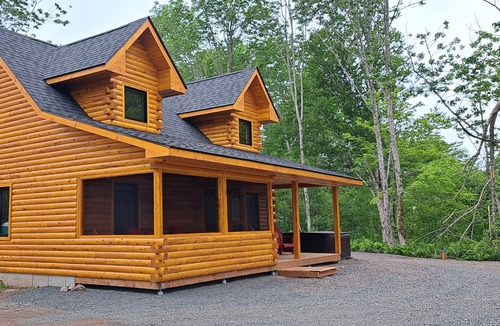 Antigonish County Cabin | Private lakefront log cabin with year-round hot tub.