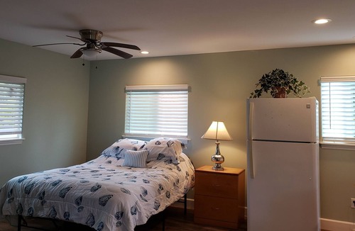 Fern Acres Apartment | Private large studio with wrap around lanai, new and clean.