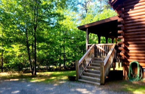 Lake Lure Cabin | Private log home with lake/beach/River/Mountains/HOT TUB/Canoes/Pets.