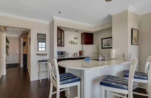 Boyne City Condo | Private Patio on Lake Charlevoix | Ground Floor Getaway with sunset views |