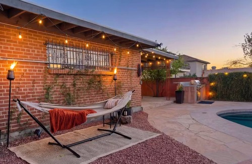 Feldman's House | Private Pool Oasis w/Game Room, Fire Pit & Backyard Lounge