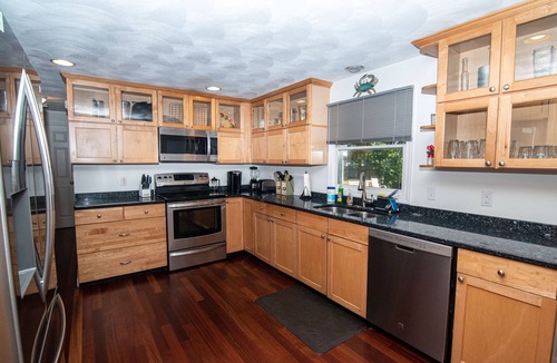 Saunderstown House | Private-Relax on front rockers or rear yard covered deck. Easy access Route 1A.