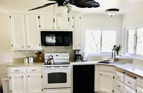 Lotus House | Private River and Mountain Views from Cozy Cabin, Covered Deck and Beach!