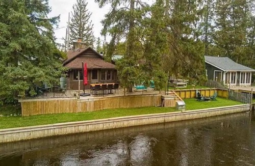 Indian River Cabin | Private River Frontage Cabin! 🌲🚣‍♂️ Paddle, Float, and Relax to Burt Lake!