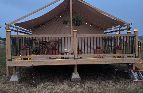 Miller Grove RV Rental | Private safari tent with ac/heat, Wifi and an exceptional view off a large deck.
