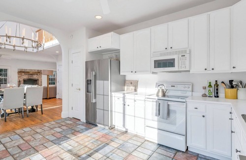 North Sea House | Private setting with treetop views, resort style pool and jacuzzi, fully.