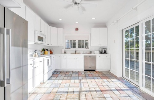 North Sea House | Private setting with treetop views, resort style pool and jacuzzi, fully.