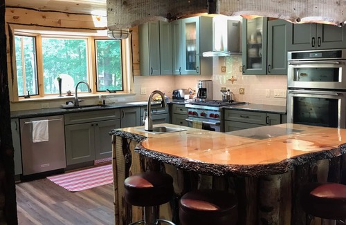 Mayfield Cabin | Private spacious lakefront lodge on 180 acres.