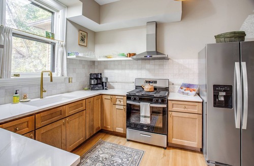 East Avenue Apartment | Private Suite with King Bed, Steps from Park Ave and East Ave!