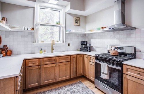 East Avenue Apartment | Private Suite with King Bed, Steps from Park Ave and East Ave!