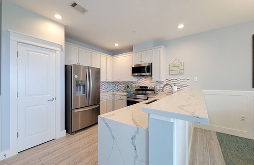 Red Fish Cove Condo | Private Three Mile Beach plus BRAND NEW ELEVATOR and KITCHEN!