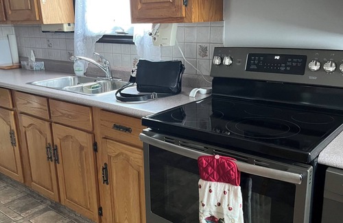 Summerside House | Private two bedroom home near Summerside with office; AC; fireplace; TV; wifi