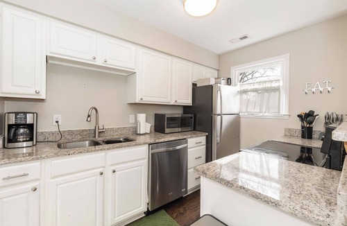 Apex House | Private, Updated Townhouse in DT Apex