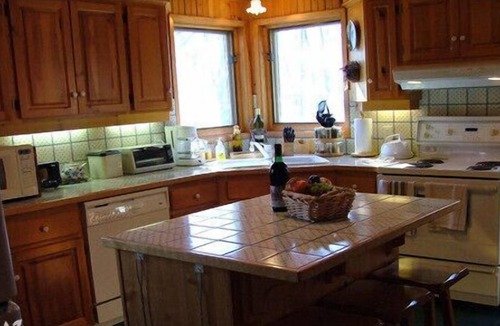 Big Bay House | Private waterfront home with fire pit on shore . perfect for family gatherings
