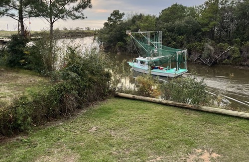 Kreole Cottage | Private Waterfront Retreat 3BD/4BA Hot Tub 2 Boat Docks & Relaxing Coastal Views