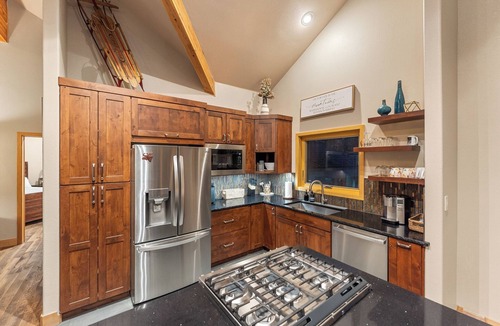 Three Peaks House | Private Wooded Setting with Open-Concept Layout and Updated Kitchen