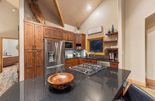 Three Peaks House | Private Wooded Setting with Open-Concept Layout and Updated Kitchen