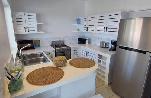 La Iglesia Condo | PROMO Beachfront sunsets with Starlink WIFI