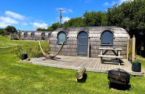 Looe House | Prosecco - Lydcott Glamping Cornwall, sea views