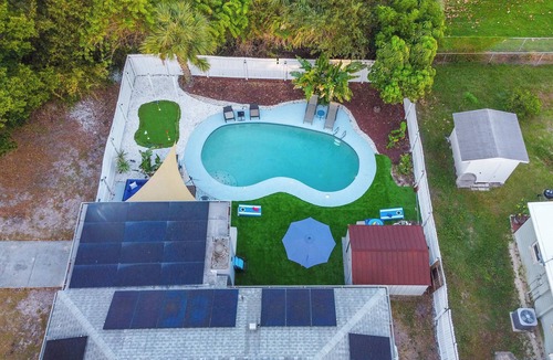 Sun Bay South House | Putting Green Oasis: BBQ, Cornhole, Heated Pool