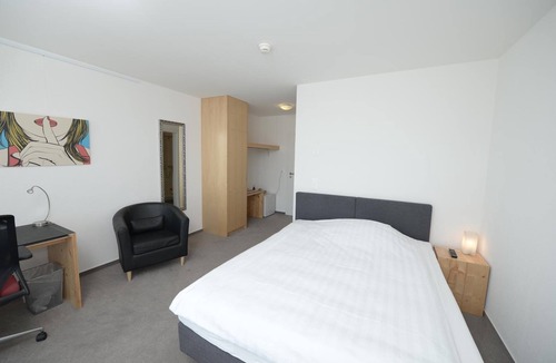 Belp Hotel | QCM Campus