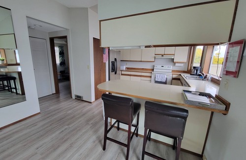 Belfair House | Quaint beachfront home with bulkhead and swim float.