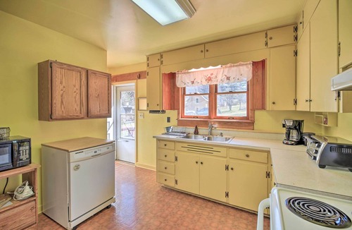 Atkins House | Quaint Creekside Home w/Spacious Deck & Yard