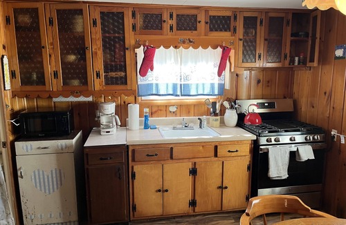 Kalkaska Cottage | Quaint Family lake cottage w/beach, dock,internet on all sports Crawford Lake