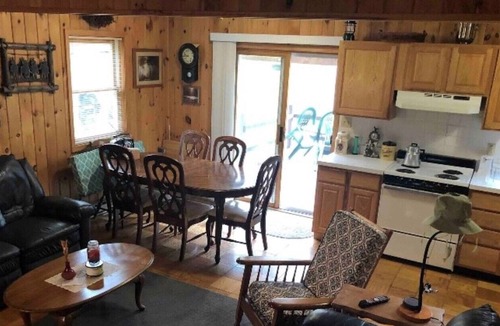 East Branch House | Quaint Log-Face Home to Escape Reality