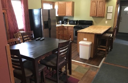 Superior Apartment | Quaint Upstairs Apartment with peaceful treetop deck, close to downtown.