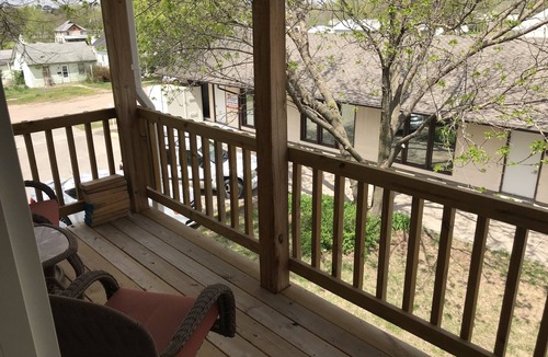 Superior Apartment | Quaint Upstairs Apartment with peaceful treetop deck, close to downtown.