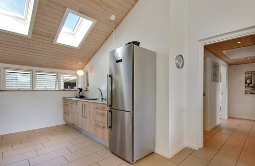 Øksenmølle House | Quality holiday home with three good bedrooms and a large luxury bathroom.
