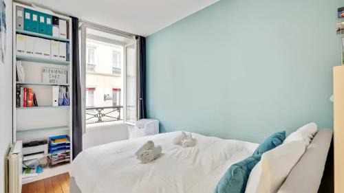 Quartier de la Porte-Saint-Denis Apartment | Quartier a la mode du Marais climatise 2 chambres