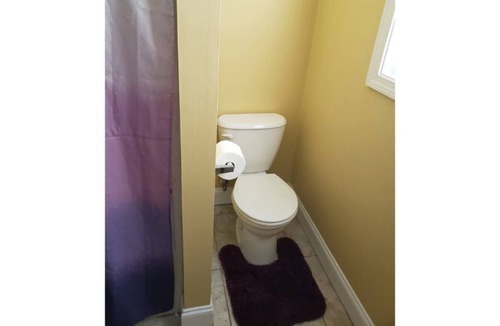 Fall River House | Queen bed close to everything.