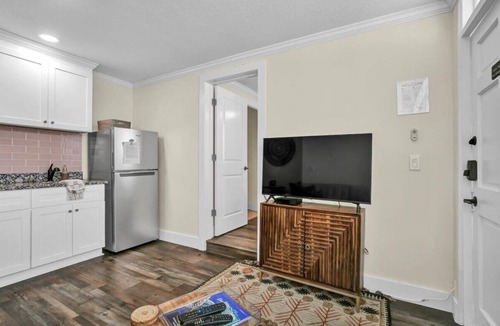Safety Harbor Hotel | Queen bed, kitchenette, living room/couch.
