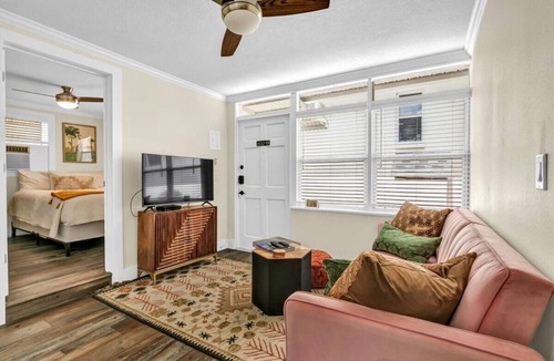 Safety Harbor Hotel | Queen bed, kitchenette, living room/couch.