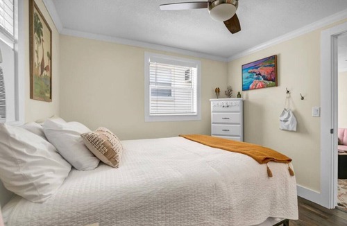 Safety Harbor Hotel | Queen bed, kitchenette, living room/couch.