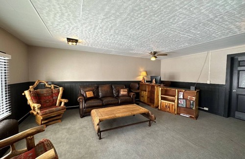 Encampment Apartment | Queen Room: Rustic Stay by Continental Divide