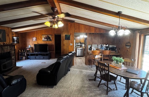 Flint Creek House | Quiet cabin in the woods w/access to pools, river, & lakes in gated community!