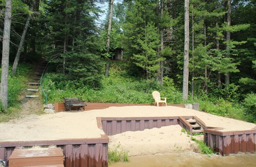 Alger Cabin | Quiet Lakefront Cabin with Private Fire Pit, Beach and Dock