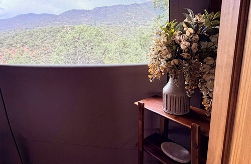 High Rolls Mountain Park RV Rental | Quiet Luxury for 2, Safari Tent Getaway- Lunaria at El Campo Glamping