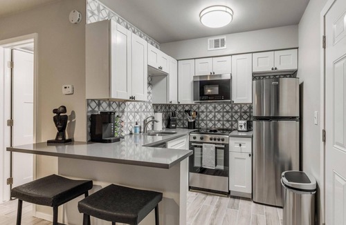 Oklahoma City Condo | Quiet Modern Heavenly Paradise Love and Balcony + Free Coffee near Lake Hefner