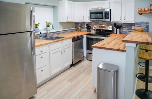 Lawrence House | Quiet, private, and fully remodeled. Minutes from KU and Mass